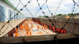 Explore the role, challenges, and future of private prisons in South Africa, including Mangaung and Kutama Sinthumule.